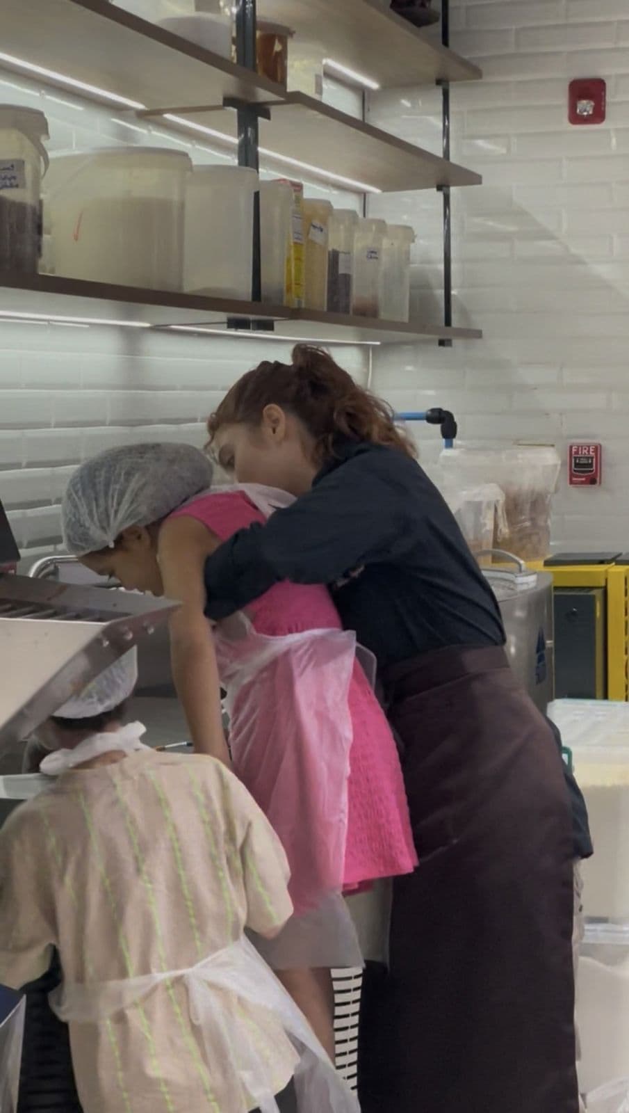 Chef helping children